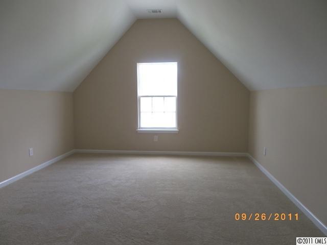 2766 Rustic Ridge Court Rock Hill, SC 29730 - Photo 13 of 13 an empty room with a window