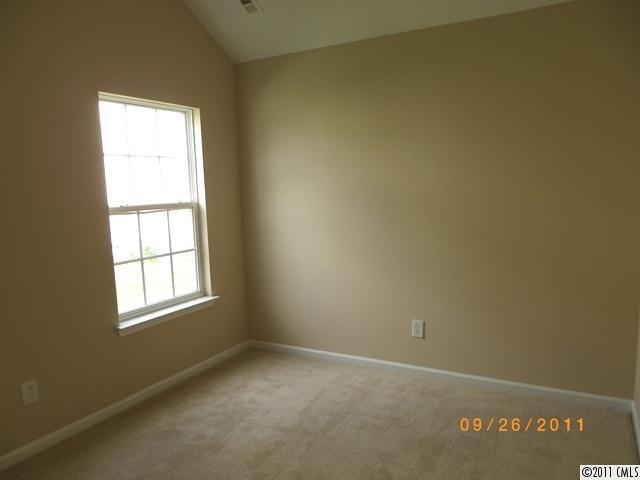 2766 Rustic Ridge Court Rock Hill, SC 29730 - Photo 10 of 13 an empty room with windows