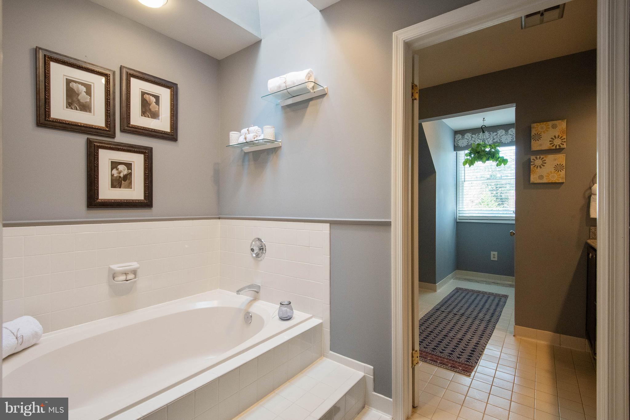 313 Canterfield Road Annapolis, MD 21403 - Photo 25 of 42 a bathroom with a bathtub and a shower