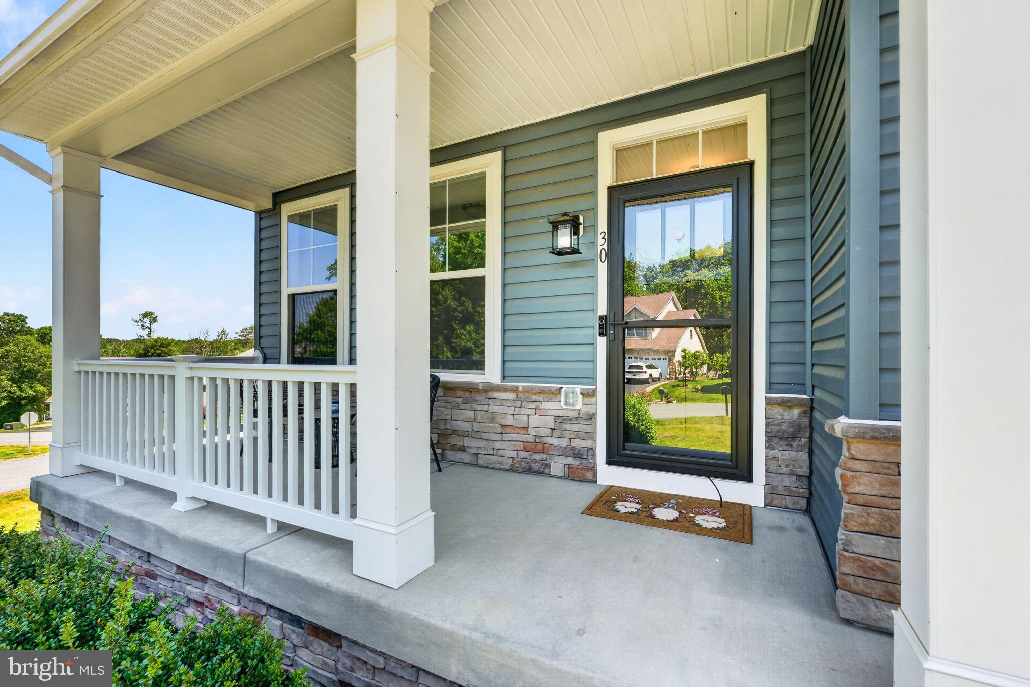 30 Range Road North East, MD 21901 - Photo 7 of 73 a view of a porch with wooden floor and fence