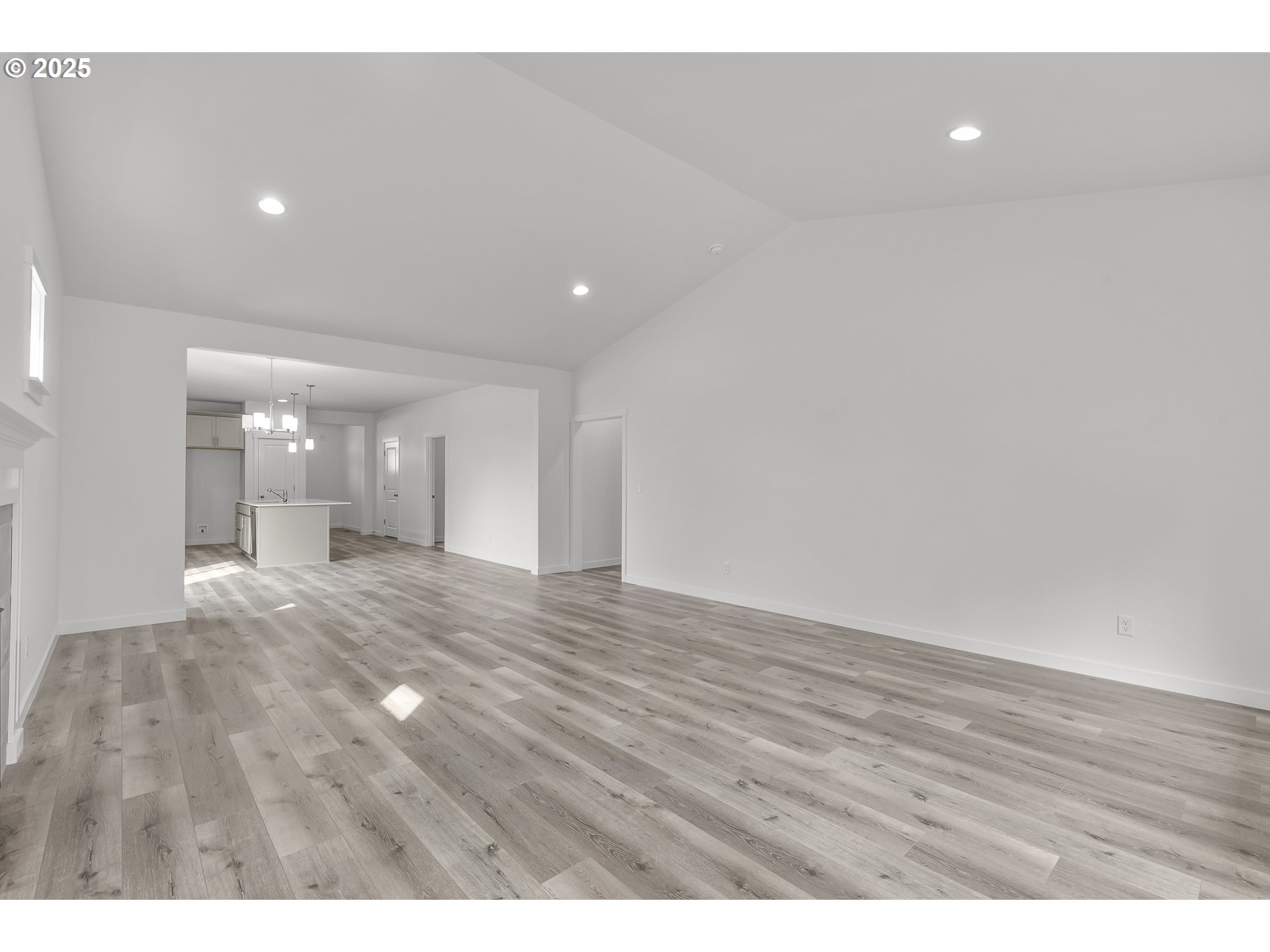 702 Tigerlily Street Silverton, OR 97381 - Photo 10 of 31 a view of an empty room and wooden floor