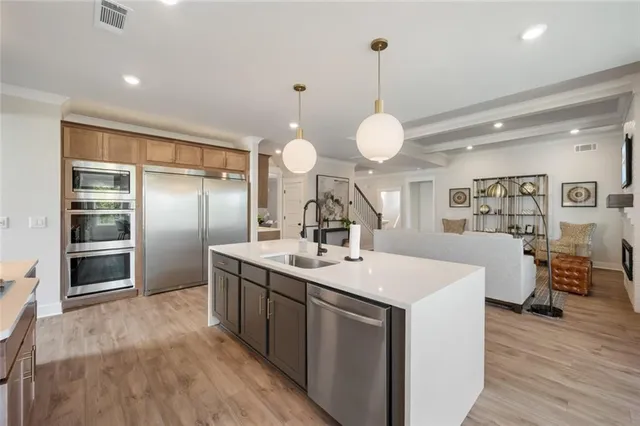 a spacious bedroom with a bed and ceiling fan
