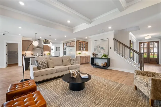 a living room with furniture and a rug