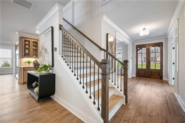 a view of a pathway with a house in the background