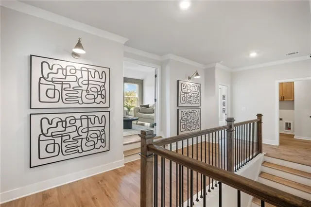 a front view of a house with a yard table and chairs
