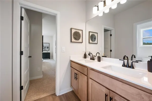a view of a cafe with a couple of people in front of retail shop