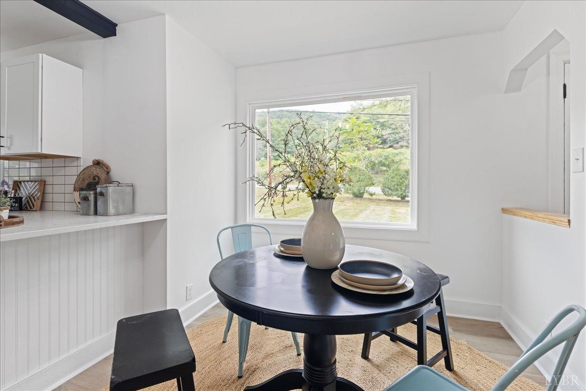15 Cannery Loop Lovingston, VA 22949 - Photo 12 of 60 a view of a dining room with furniture and window
