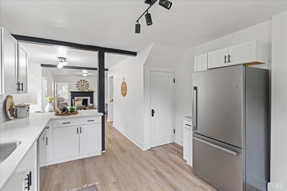 15 Cannery Loop Lovingston, VA 22949 - Photo 16 of 60 a kitchen with stainless steel appliances a refrigerator and a sink