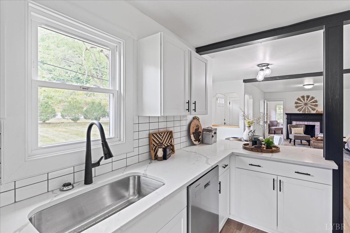 15 Cannery Loop Lovingston, VA 22949 - Photo 17 of 60 a kitchen with a sink and a large window