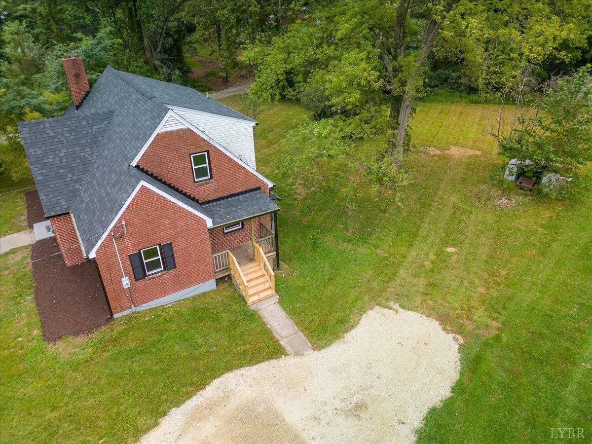 15 Cannery Loop Lovingston, VA 22949 - Photo 32 of 60 a view of a house with a yard