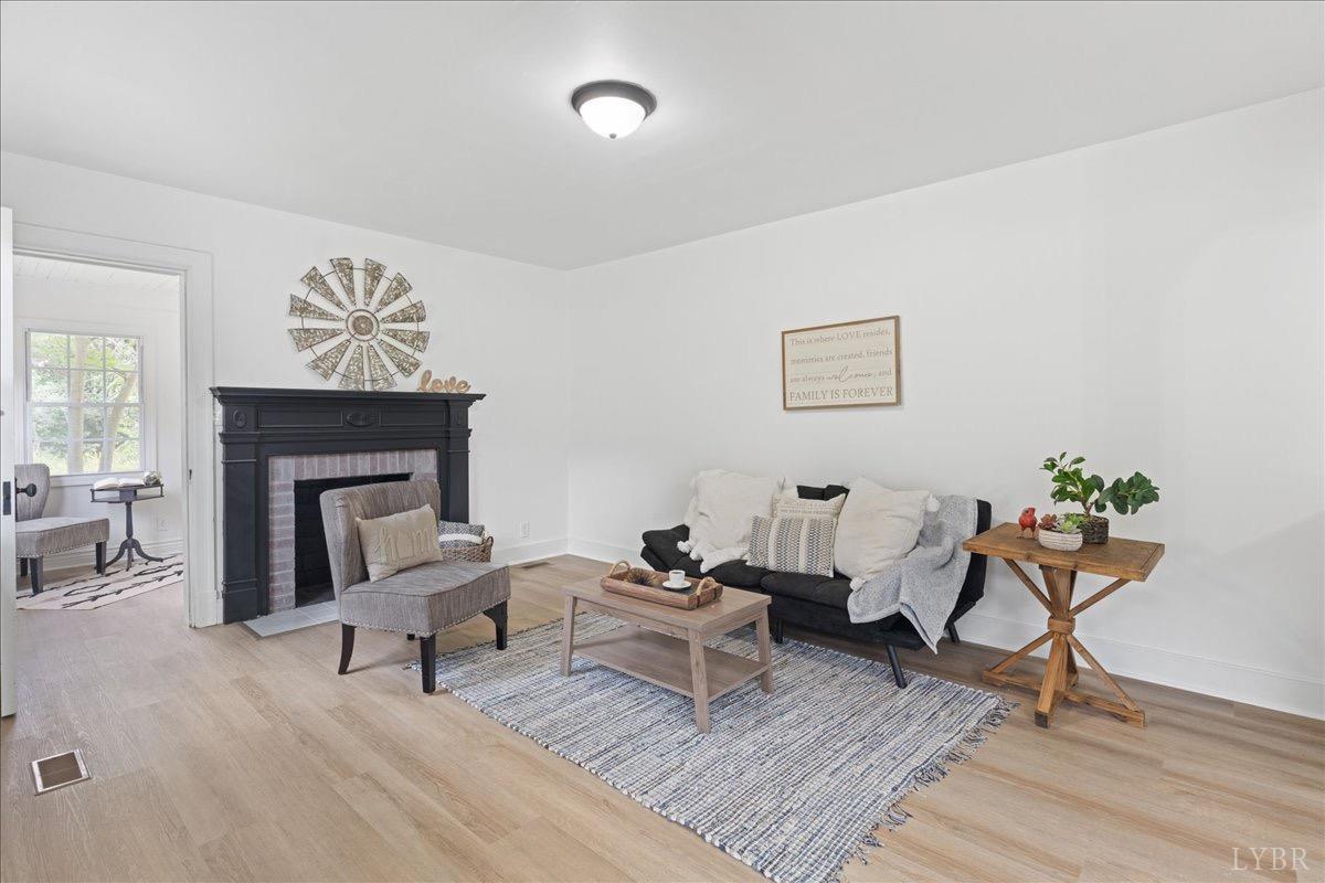 15 Cannery Loop Lovingston, VA 22949 - Photo 7 of 60 a living room with furniture and a fireplace