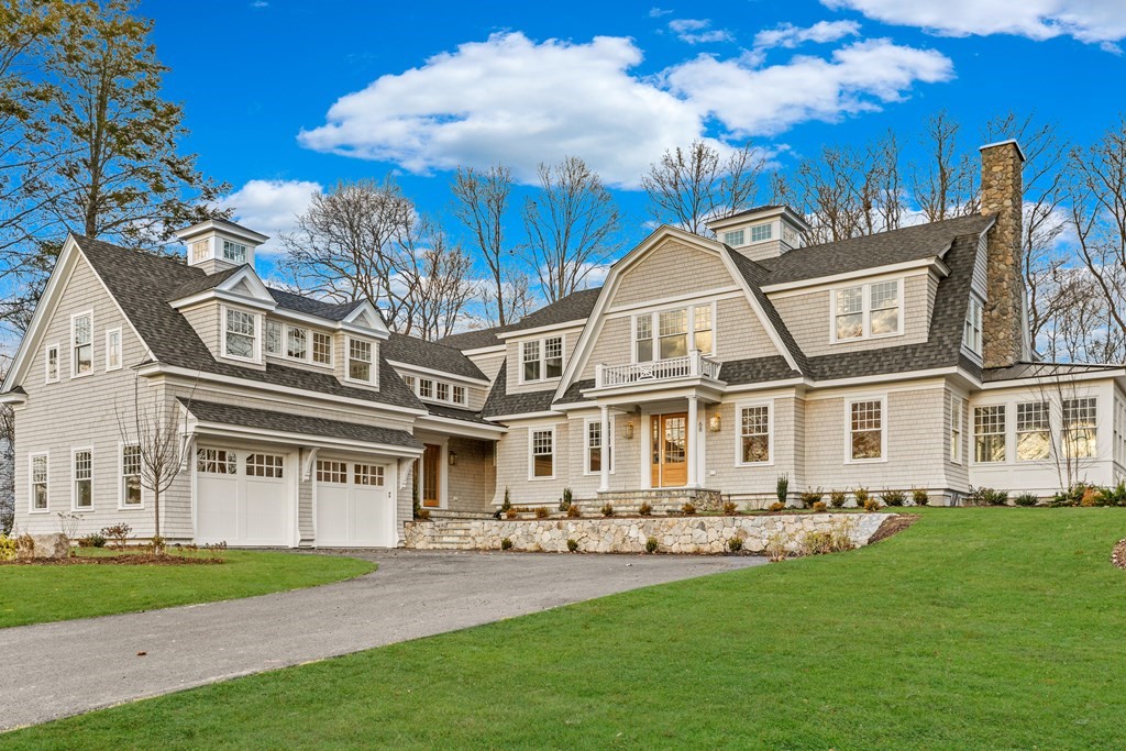 front view of a house with a garden
