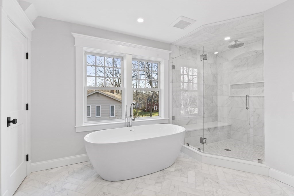 68 Bel Air Road Hingham, MA 02043 - Photo 25 of 36 a bathroom with a bathtub and a shower