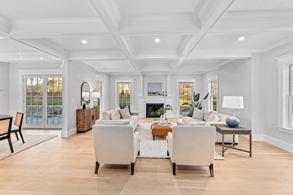 68 Bel Air Road Hingham, MA 02043 - Photo 9 of 36 a living room with fireplace furniture and a large window