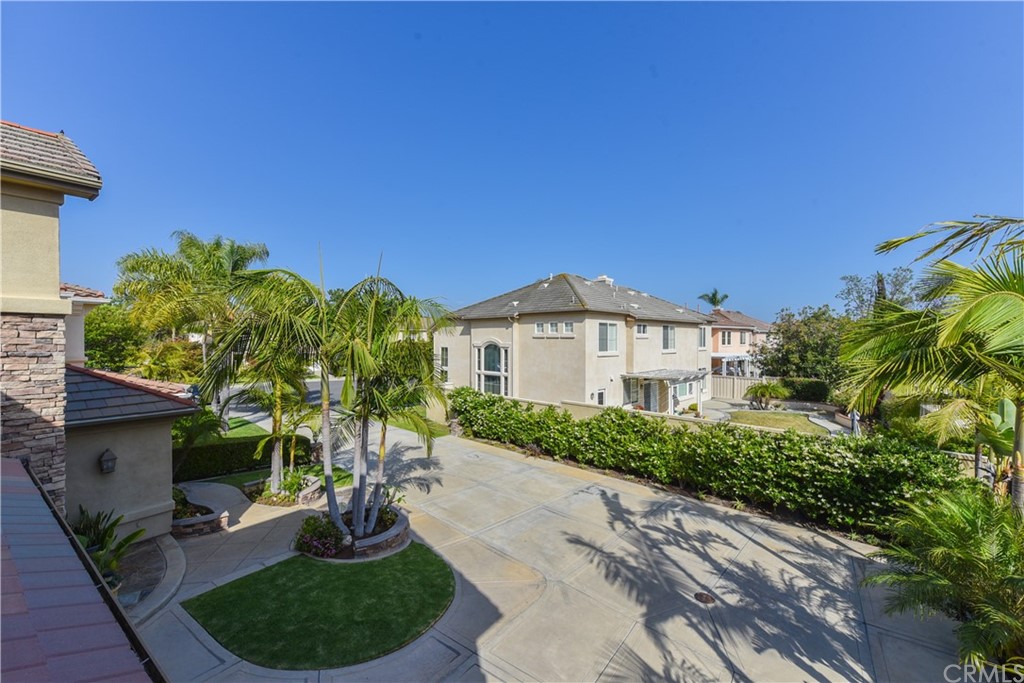 23 Benavente Irvine, CA 92606 - Photo 43 of 44 a front view of a house with a yard