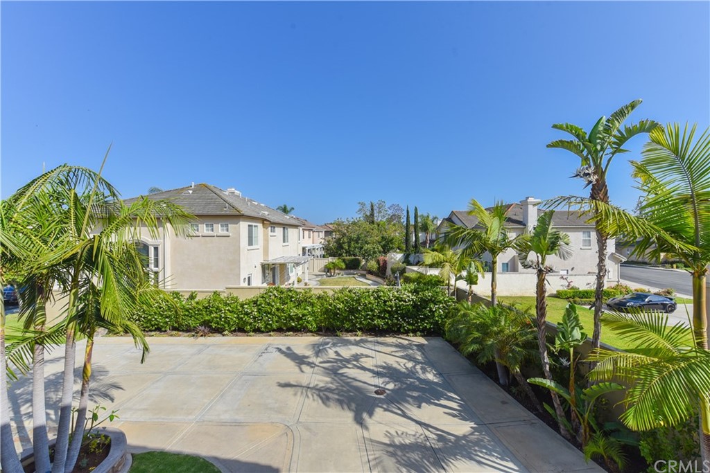 23 Benavente Irvine, CA 92606 - Photo 44 of 44 a front view of a house with a yard
