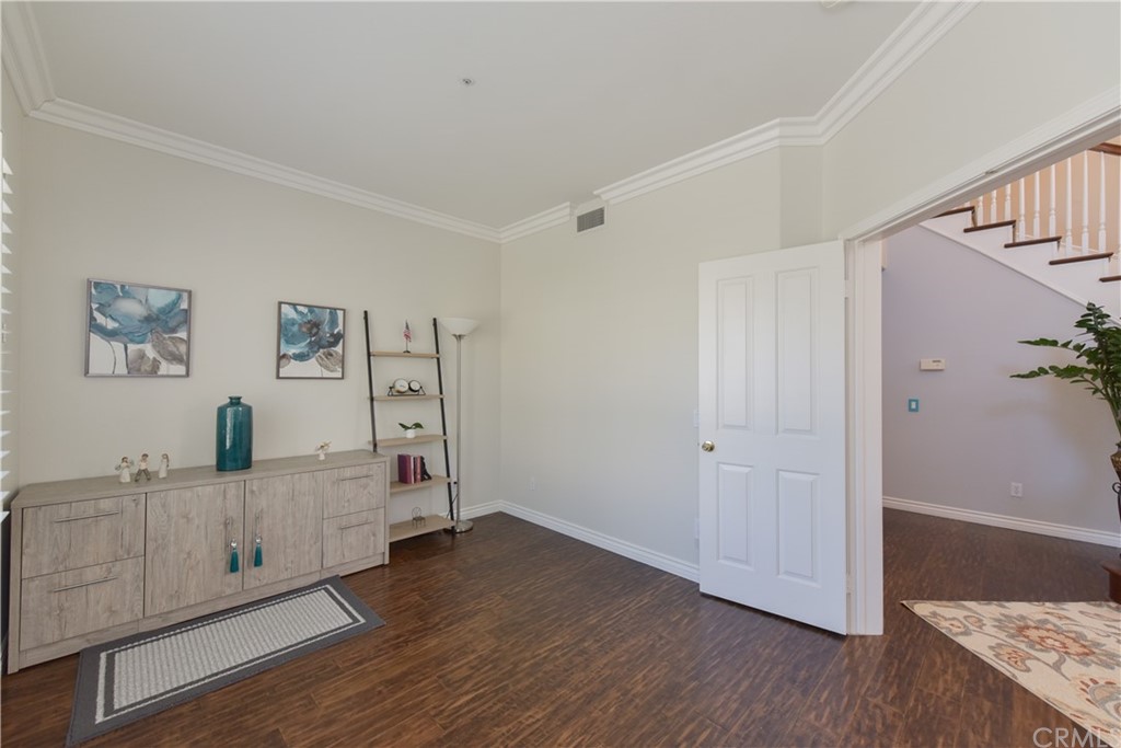 23 Benavente Irvine, CA 92606 - Photo 6 of 44 a view of a livingroom with wooden floor and furniture