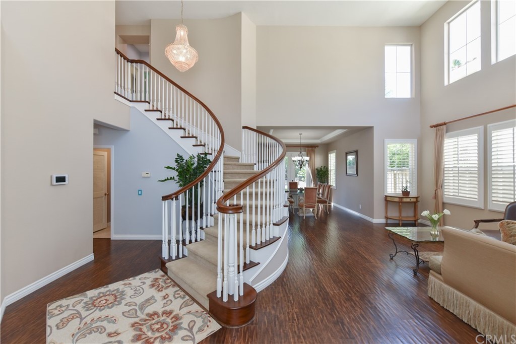 23 Benavente Irvine, CA 92606 - Photo 7 of 44 a view of entryway livingroom and hall with wooden floor