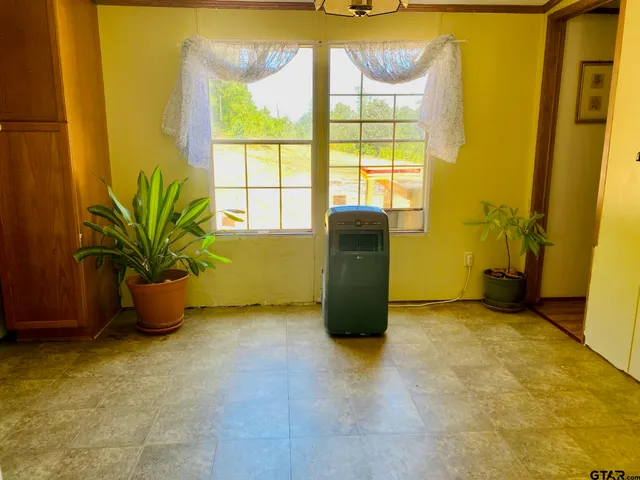 a bathroom with a mirror