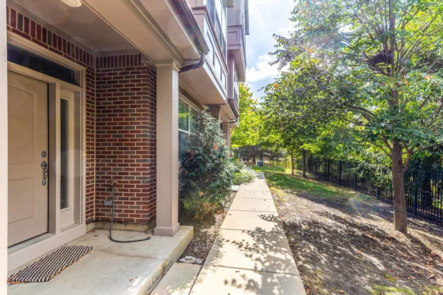 a view of a pathway with a house in the background