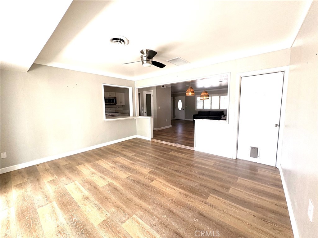 26378 Ridgemoor Road Menifee, CA 92586 - Photo 4 of 20 a view of a hallway with wooden floor