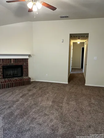 a view of a livingroom with a fireplace