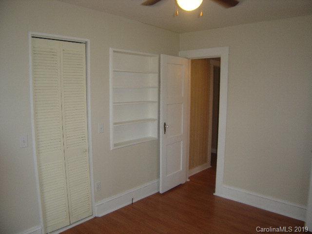 575 State Street Marion, NC 28752 - Photo 12 of 18 a view of empty room with wooden floor