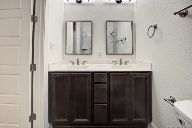 a bathroom with a bathtub and window