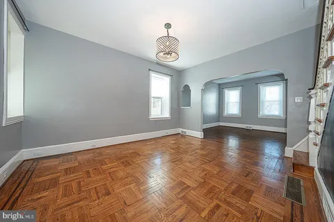 a kitchen with stainless steel appliances granite countertop a refrigerator sink and microwave