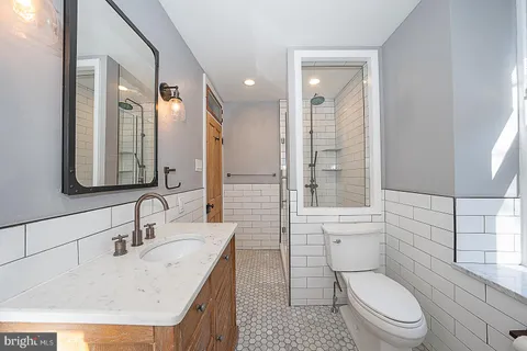 a view of hallway with washer and dryer