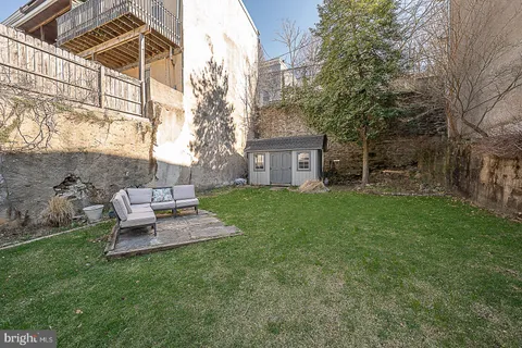 a view of a patio front of house
