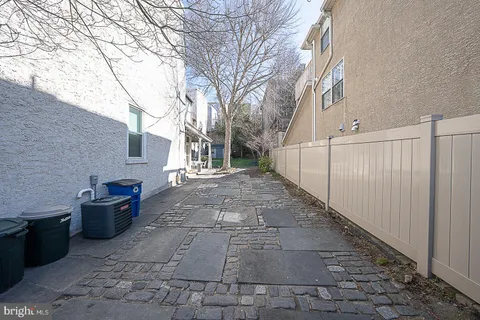 a view of a swimming pool with a yard