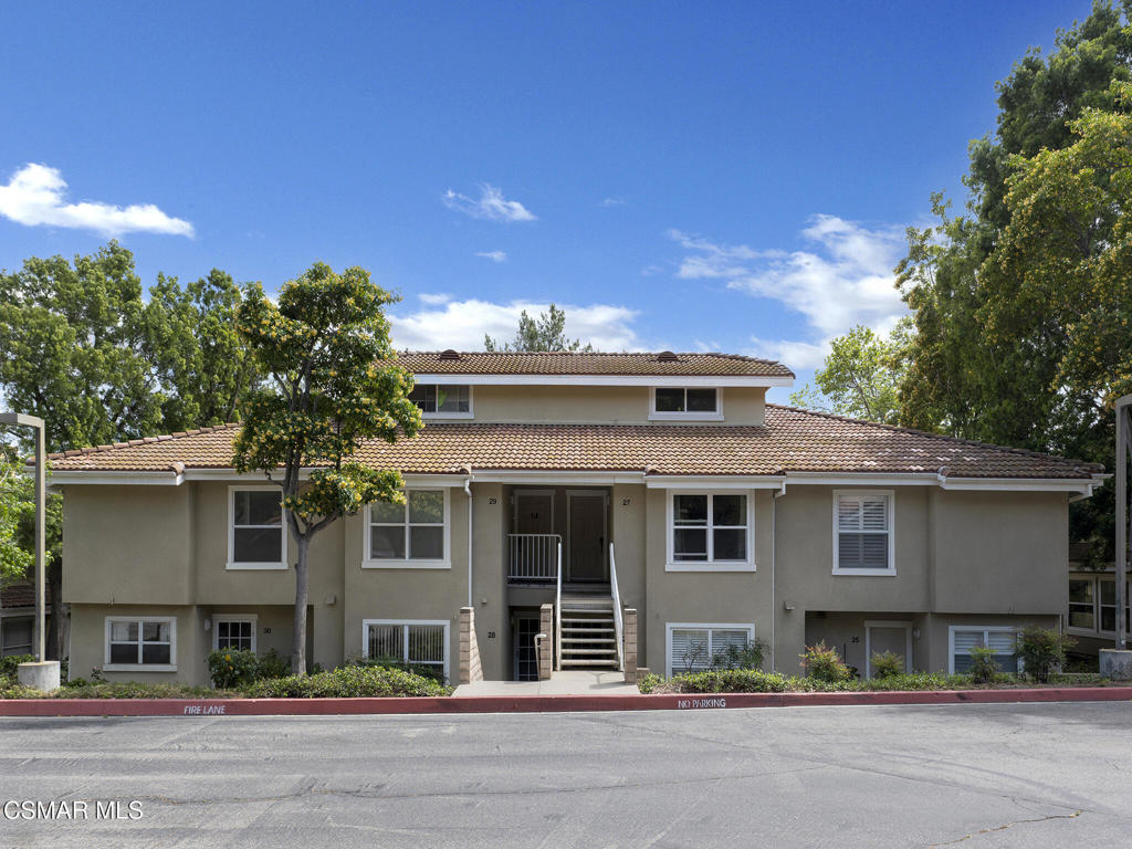 2731 Erringer Road, Unit 28 Simi Valley, CA 93065 - Photo 28 of 30 front view of a house with a street