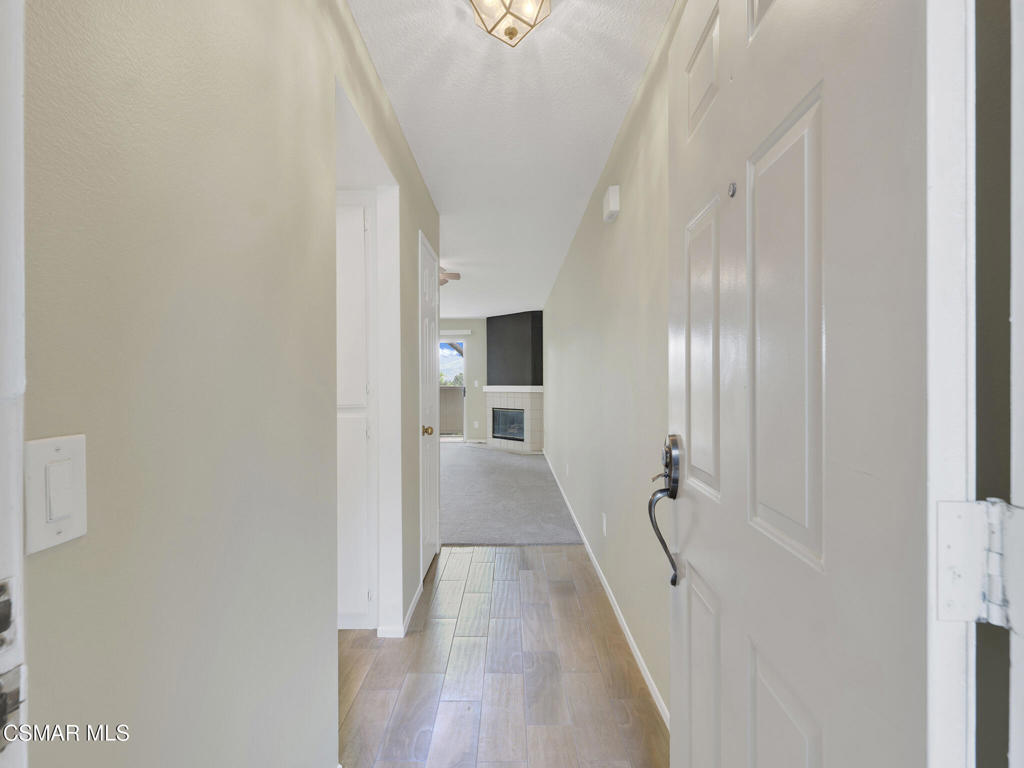 2731 Erringer Road, Unit 28 Simi Valley, CA 93065 - Photo 8 of 30 a view of a hallway with a white walls