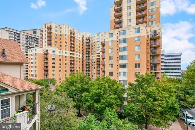 a view of a swimming pool with lounge chair