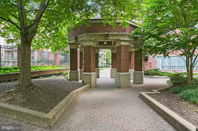 a view of a livingroom with couch and a large window