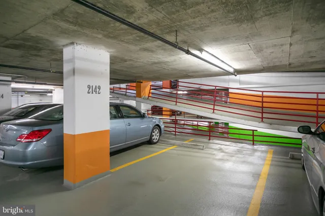 a view of outdoor space with fountain and large trees