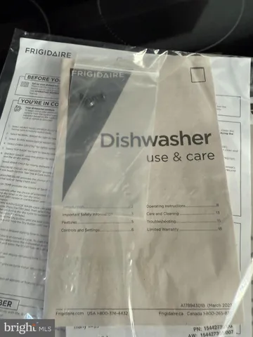 a view of a house with a yard and plants