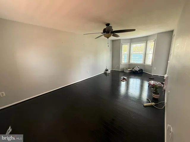 a view of a patio with a table chairs and a patio
