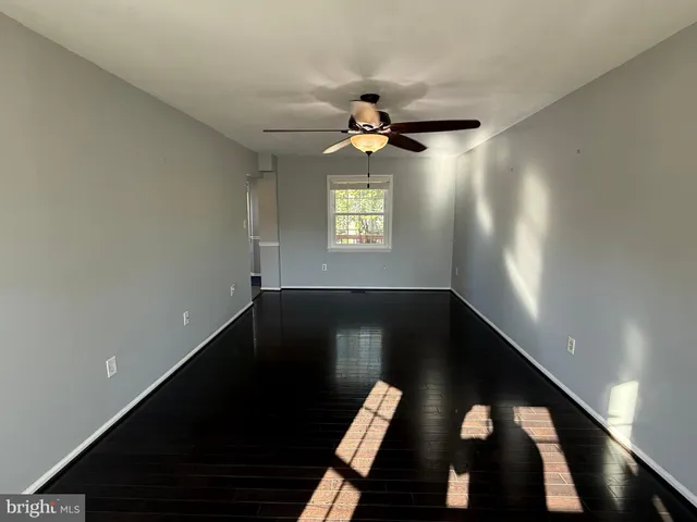 a view of green field with trees