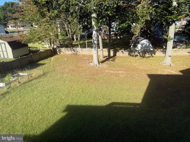 a bedroom with a bed and a table in it