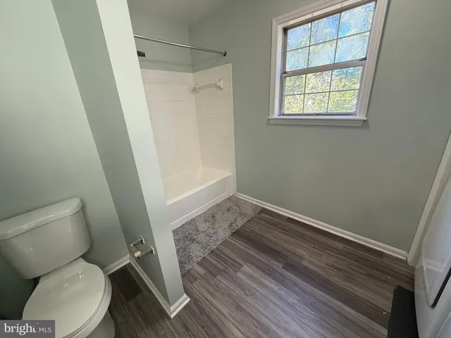 a view of walk in closet with window