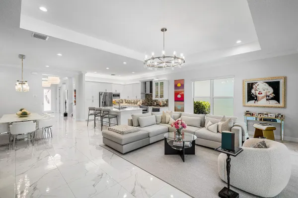 a very nice looking living room with a large window