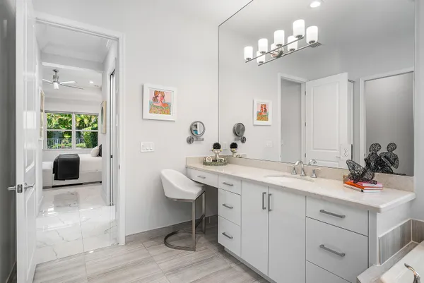 a utility room with sink dryer and washer