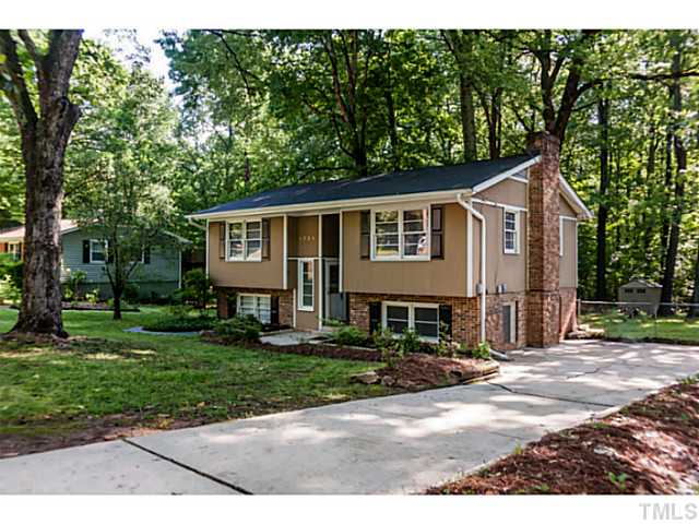 1731 Euclid Road Durham, NC 27713 - Photo 1 of 25 a front view of a house with a yard