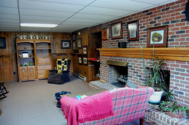 393 Harrison Road Boone, NC 28607 - Photo 9 of 28 a living room with furniture and a fireplace