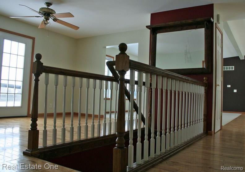 4092 Country Road Otter Lake, MI 48464 - Photo 9 of 23 Decorative Stair Railing.jpg