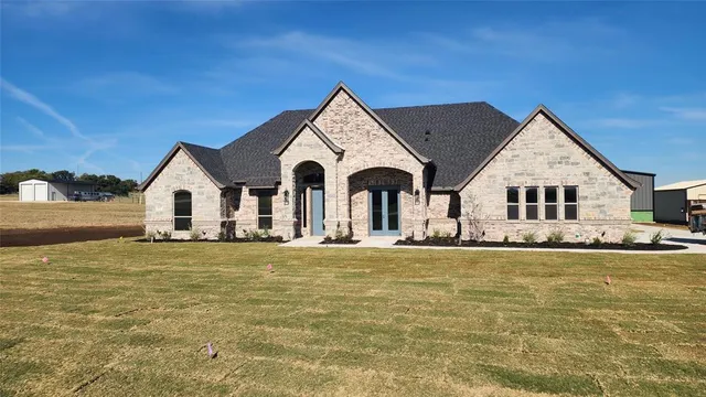 a view of a house with swimming pool and porch