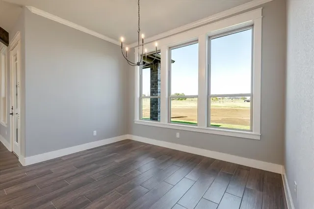 a bathroom with double vanity sink a mirror and a shower