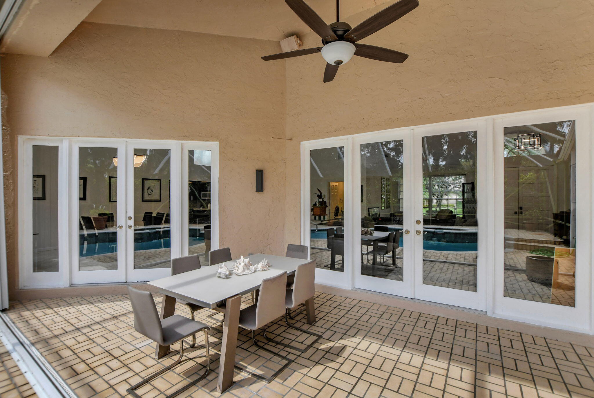 7636 Dorchester Road Boynton Beach, FL 33472 - Photo 35 of 58 Patio/Pool Area